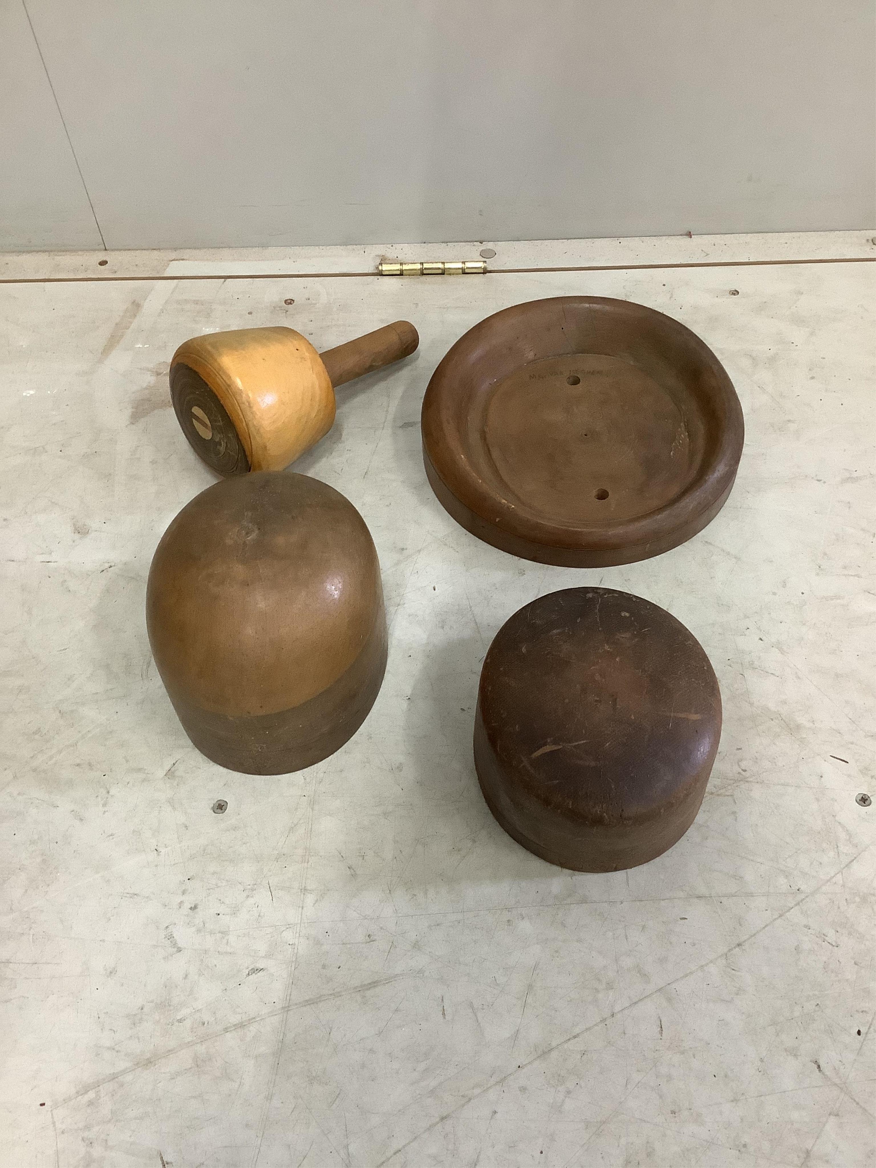 A large collection of milliner's hat moulds and leather workers mallets. Condition - fair